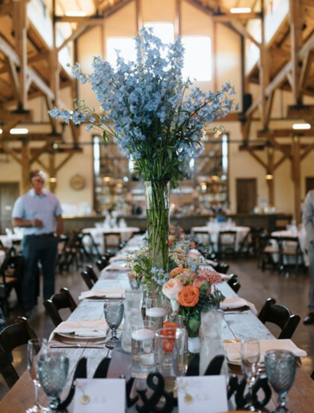 Tablescape at a wedding reception of Fleurish Flower Farm flowers.